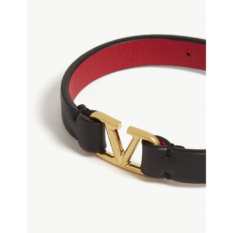 Shop Valentino Garavani Women's Black Gold Vlogo Bracelet