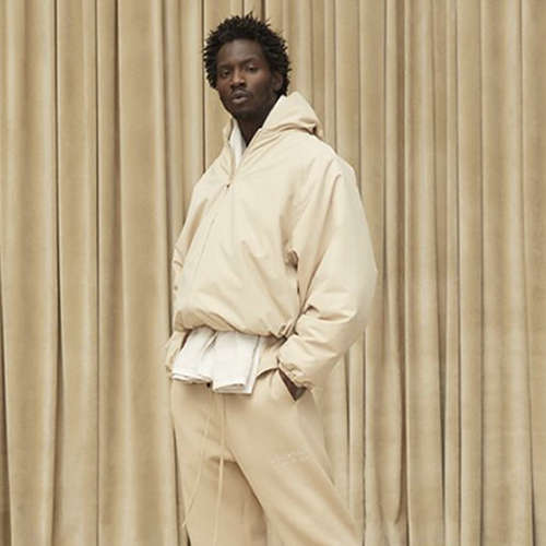 Fear of god discount essentials hoodie selfridges