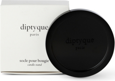 Logo-embossed candle stand