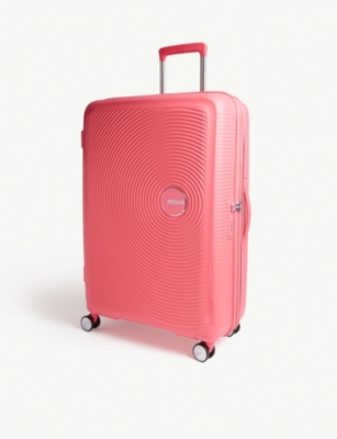 TOURISTER - expandable four-wheel suitcase 77cm | Selfridges.com