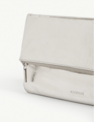 whistles silver clutch