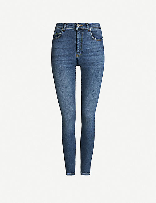 WHISTLES: Faded skinny mid-rise jeans