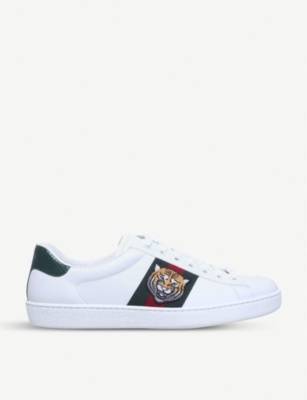 Gucci sneakers with store lion