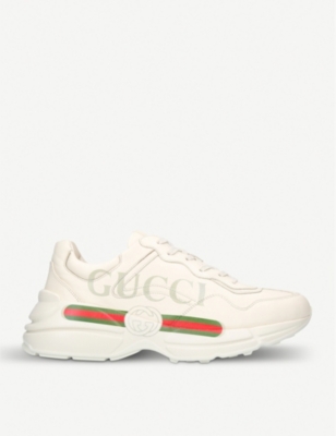 GUCCI: Men's Rhyton logo leather running trainers