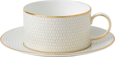 WEDGWOOD: Gio Gold china teacup and saucer set