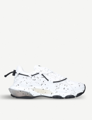 white leather trainer paint