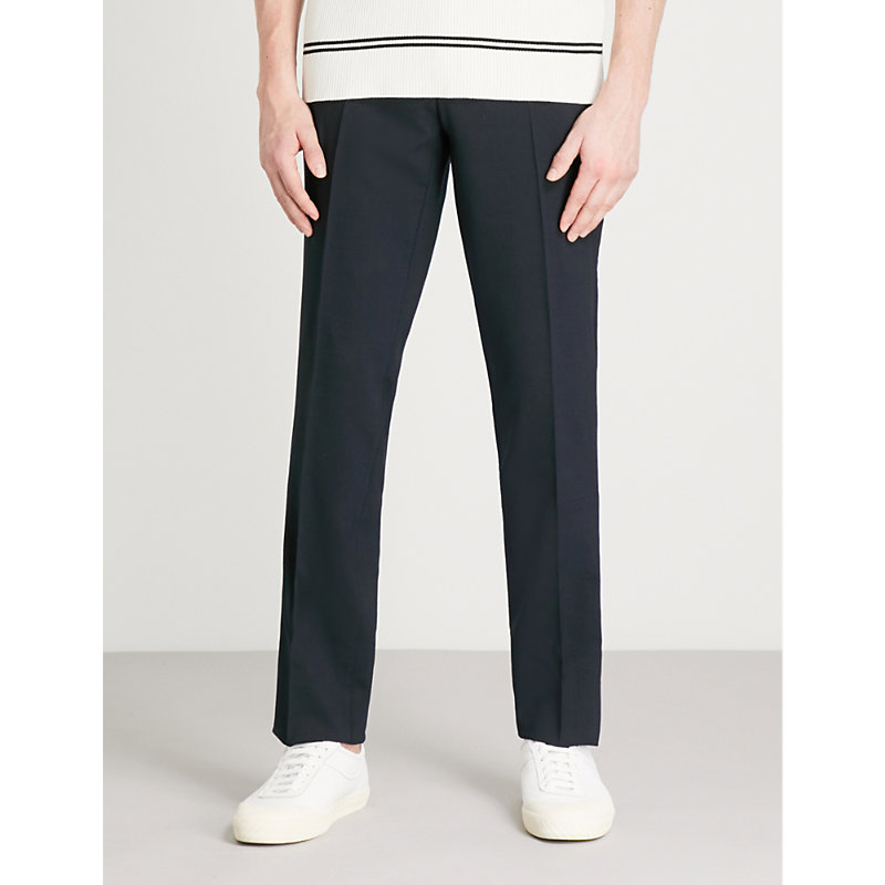Shop Sandro Men's Navy Blue Slim-fit Tapered Stretch-wool Trousers