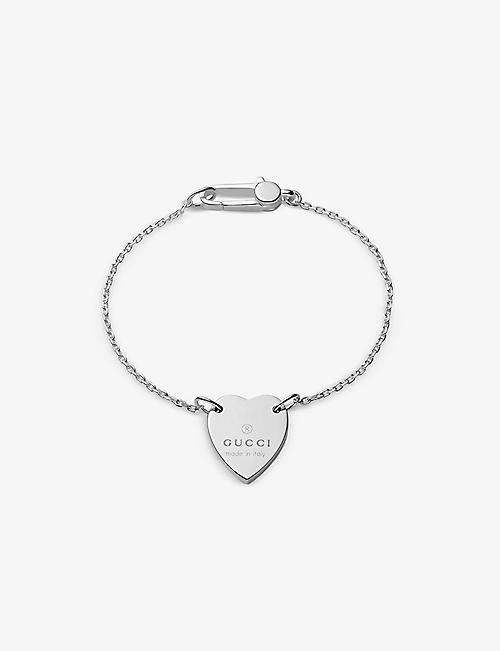 GUCCI: Trademark silver charm bracelet