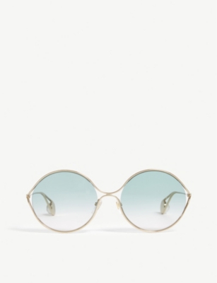 GUCCI - Gold GG0253S round sunglasses | Selfridges.com display picture 1