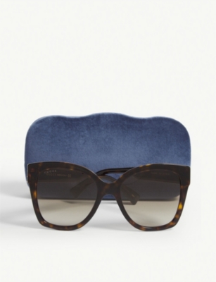 gucci sunglasses on face