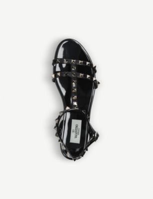 Shop Valentino Garavani Women's Black Rockstud Pvc Gladiator Sandals