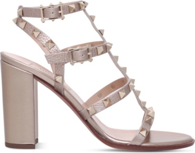 VALENTINO GARAVANI: Rockstud 90 leather heeled sandals