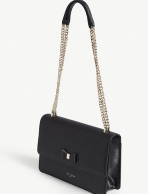 delila bow detail leather cross body bag