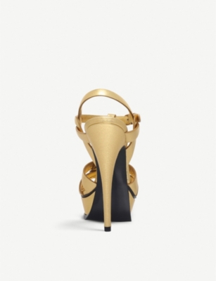 Shop Saint Laurent Women's Gold Tribute Leather Heeled Sandals
