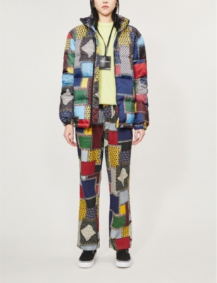 STUSSY - Patchwork-print shell-down puffer jacket | Selfridges.com