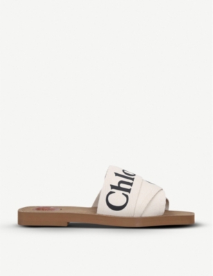 CHLOE Woody logo print canvas sandals Selfridges