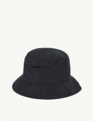 CP COMPANY - Logo-printed nylon bucket hat | Selfridges.com