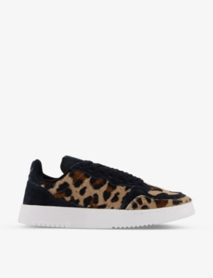 black animal print trainers