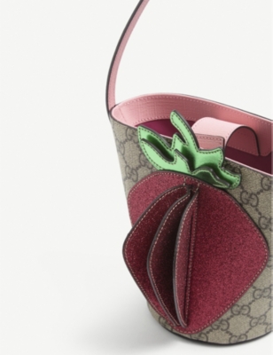 gucci supreme belt bag selfridges