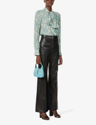 gucci supreme belt bag selfridges