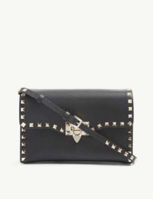 VALENTINO GARAVANI: Rockstud leather crossbody satchel