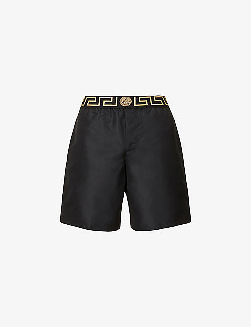 VERSACE: Brand-print straight swim shorts