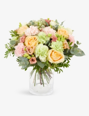 Peach roses and carnations bouquet