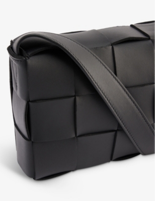 Shop Bottega Veneta Padded Cassette Leather Cross-body Bag In Black Gold