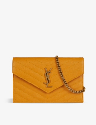 saint laurent quilted leather wallet on a chain