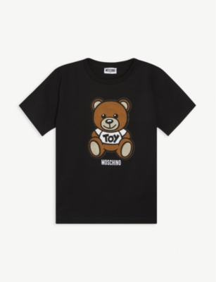 teddy bear logo on shirt
