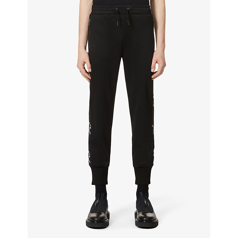 GIVENCHY REFRACTED LOGO-TAPE JERSEY TRACKSUIT TROUSERS,R03715909