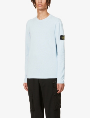 sky blue stone island sweatshirt