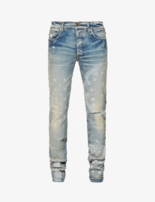 AMIRI - Bandana-print ripped slim-fit stretch-denim jeans