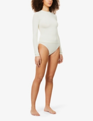 Skims Round-neck Long-sleeve Stretch-cotton Jersey Top In Bone