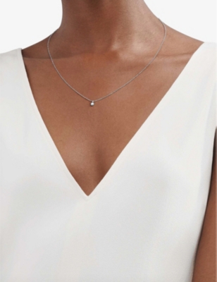 TIFFANY & CO: Platinum and 0.12ct solitaire diamond necklace