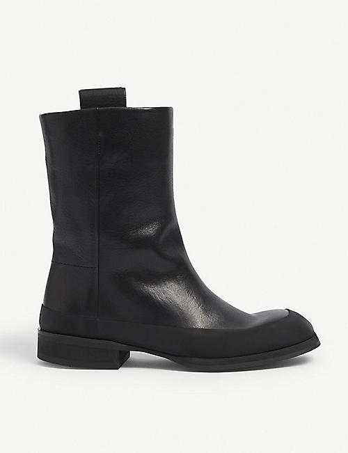THE ROW: Grunge leather ankle boots