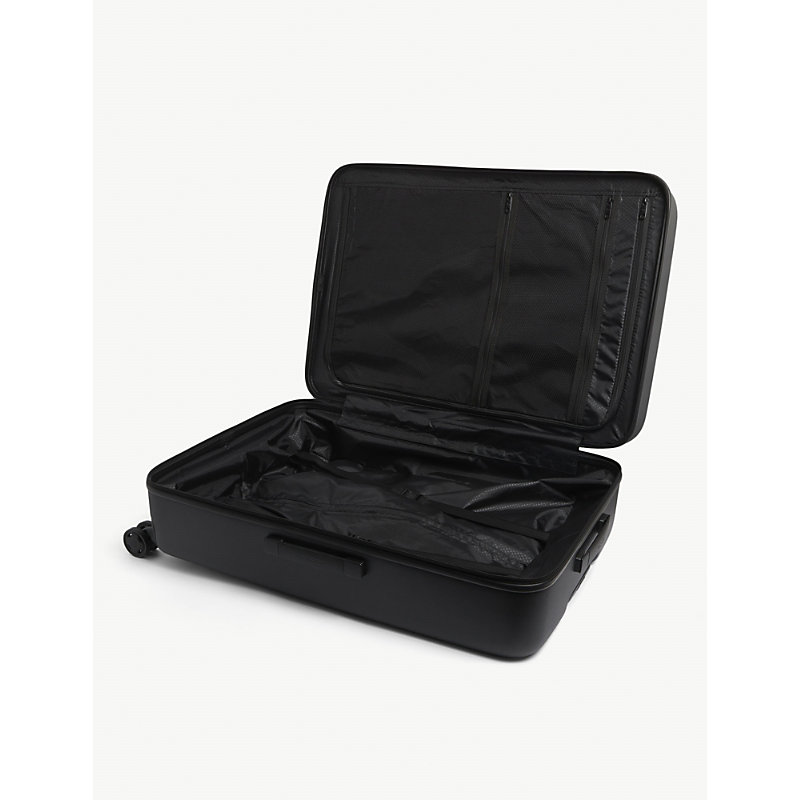 Shop Samsonite Stackd Spinner Hard Case 4 Wheel Recycled-plastic Cabin Suitcase 75cm In Black