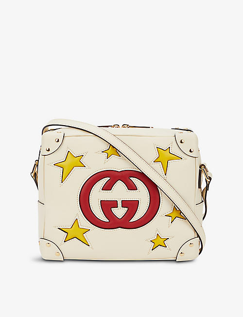 GUCCI: Star brand-print leather cross-body bag