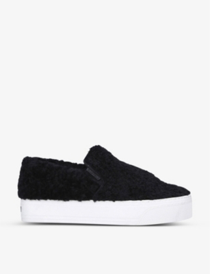 black fluffy trainers