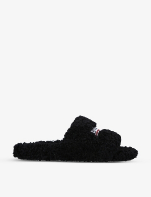 BALENCIAGA Logo embroidered faux fur sliders Selfridges