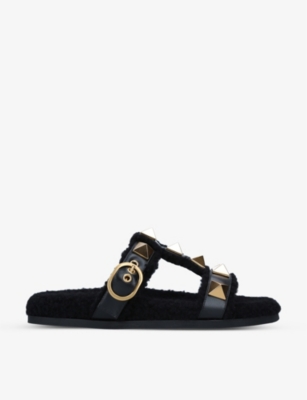 VALENTINO GARAVANI Roman Stud leather and shearling sandals