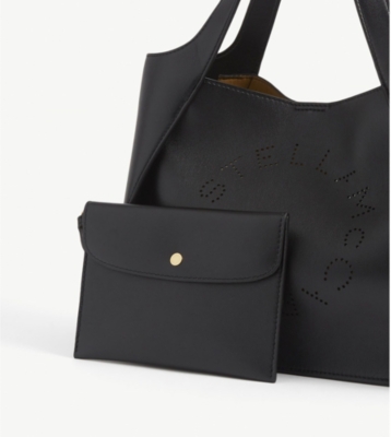 Shop Stella Mccartney Circle Faux Leather Cross-body Bag In Black