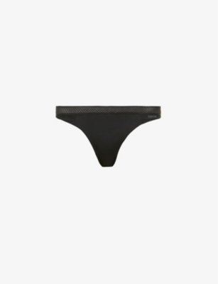 Shop Calvin Klein Women's Black Seductive Comfort Mid-rise Stretch-recycled Nylon Thong