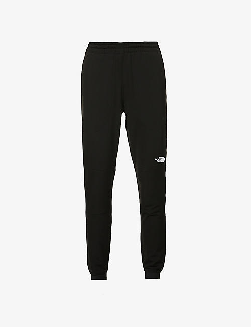 THE NORTH FACE: Tekware mid-rise tapered-leg stretch-woven trousers