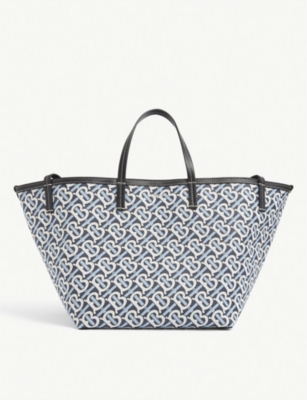 BURBERRY - Monogram-print mini E-canvas tote bag | Selfridges.com