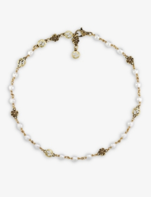 GUCCI: Interlocking GG gold-toned brass and faux-pearl bracelet