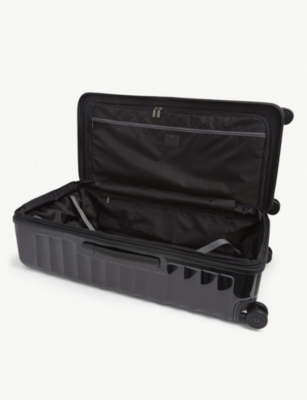 TUMI: International Expandable 19 Degree Trunk polycarbonate suitcase