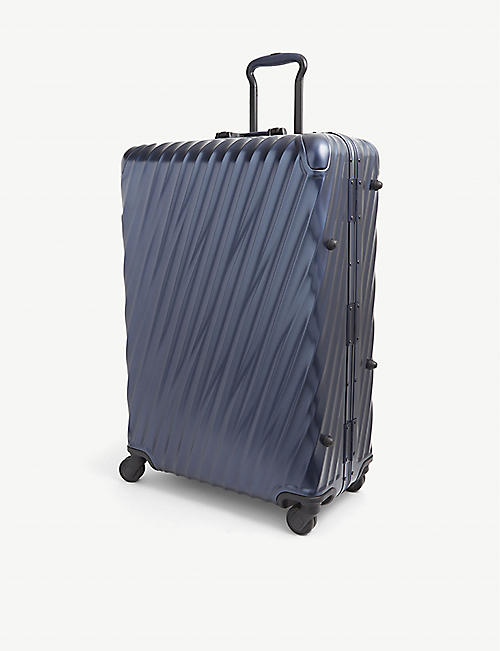 TUMI: International Expandable 19 Degree large polycarbonate suitcase