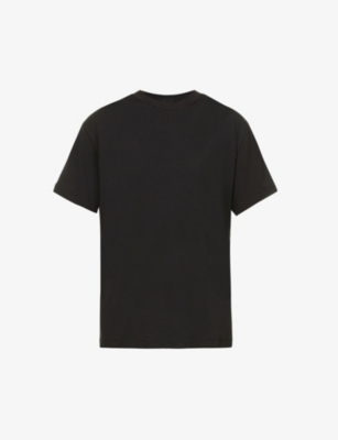 SKIMS - Boyfriend oversized stretch-jersey T-shirt | Selfridges.com