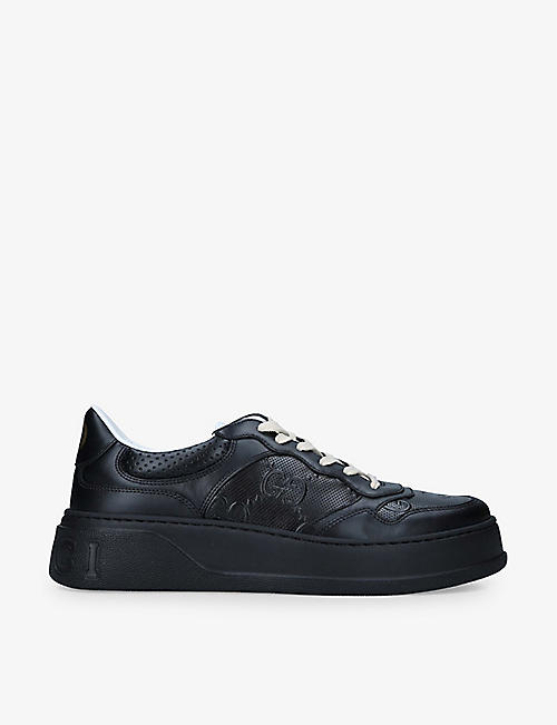 GUCCI: GG-embossed leather flatform trainers